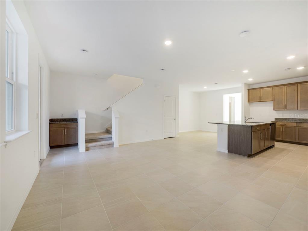 671 Clark Street Oviedo, FL 32765 - Photo 13 of 24 a view of a kitchen with a sink and a stove top oven