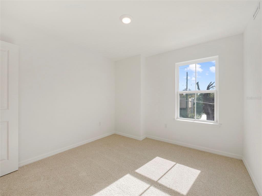 671 Clark Street Oviedo, FL 32765 - Photo 21 of 24 an empty room with a window