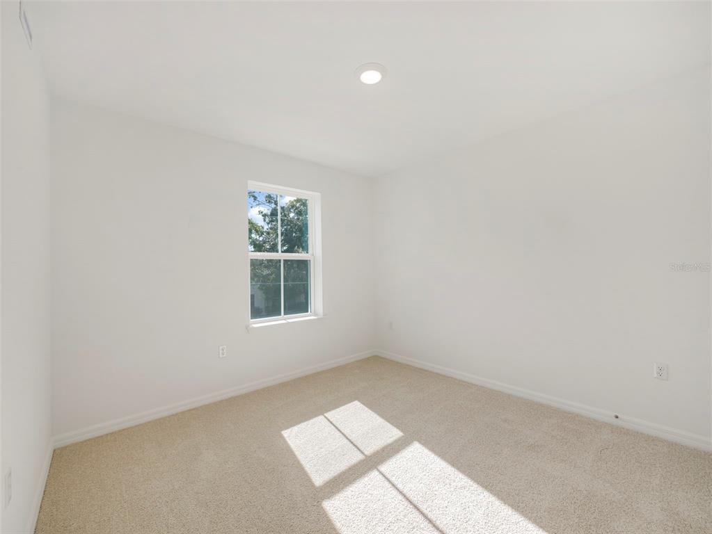 671 Clark Street Oviedo, FL 32765 - Photo 22 of 24 an empty room with a window