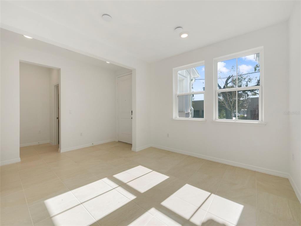 671 Clark Street Oviedo, FL 32765 - Photo 5 of 24 a view of an empty room with a window