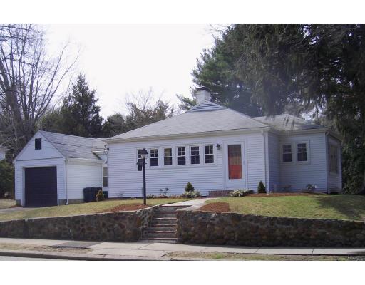 81 Stanley Road Newton, MA 02468 - Photo 1 of 17 a front view of a house with a yard