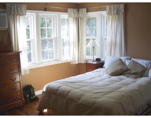 81 Stanley Road Newton, MA 02468 - Photo 8 of 17 a bedroom with a bed and a window