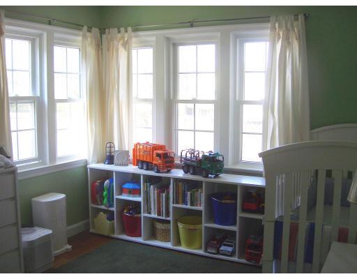 81 Stanley Road Newton, MA 02468 - Photo 10 of 17 a view of a room that has a table and a chair