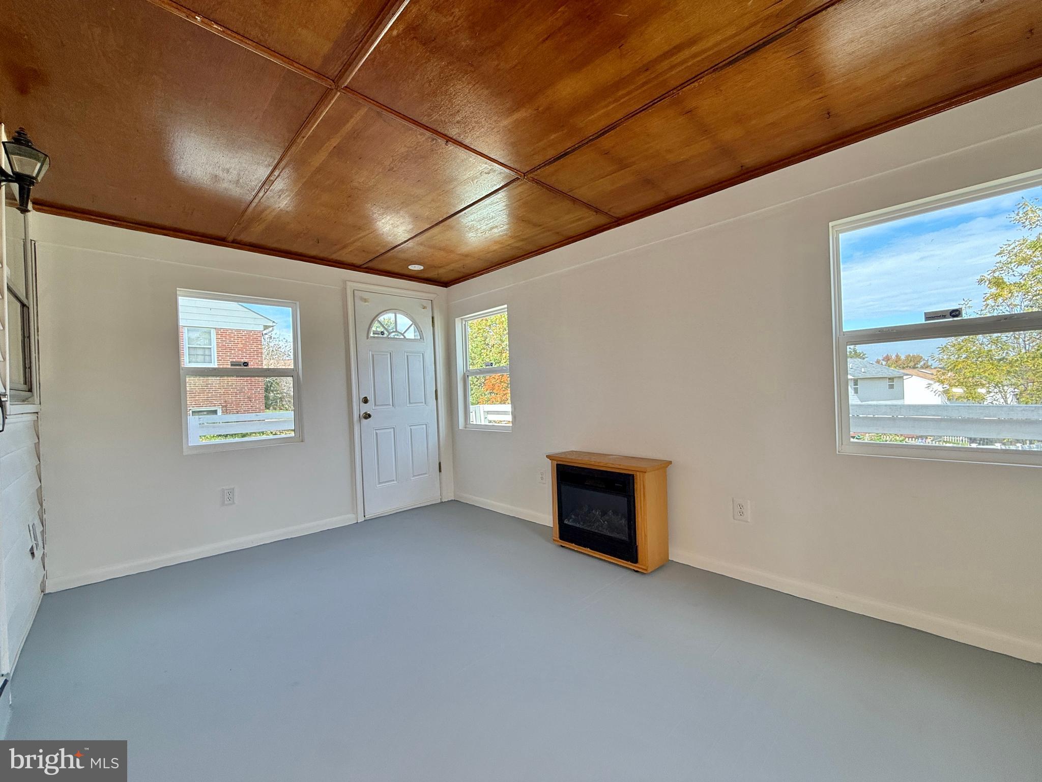 2002 Old Frederick Road Baltimore, MD 21228 - Photo 11 of 36 a view of an empty room with a window