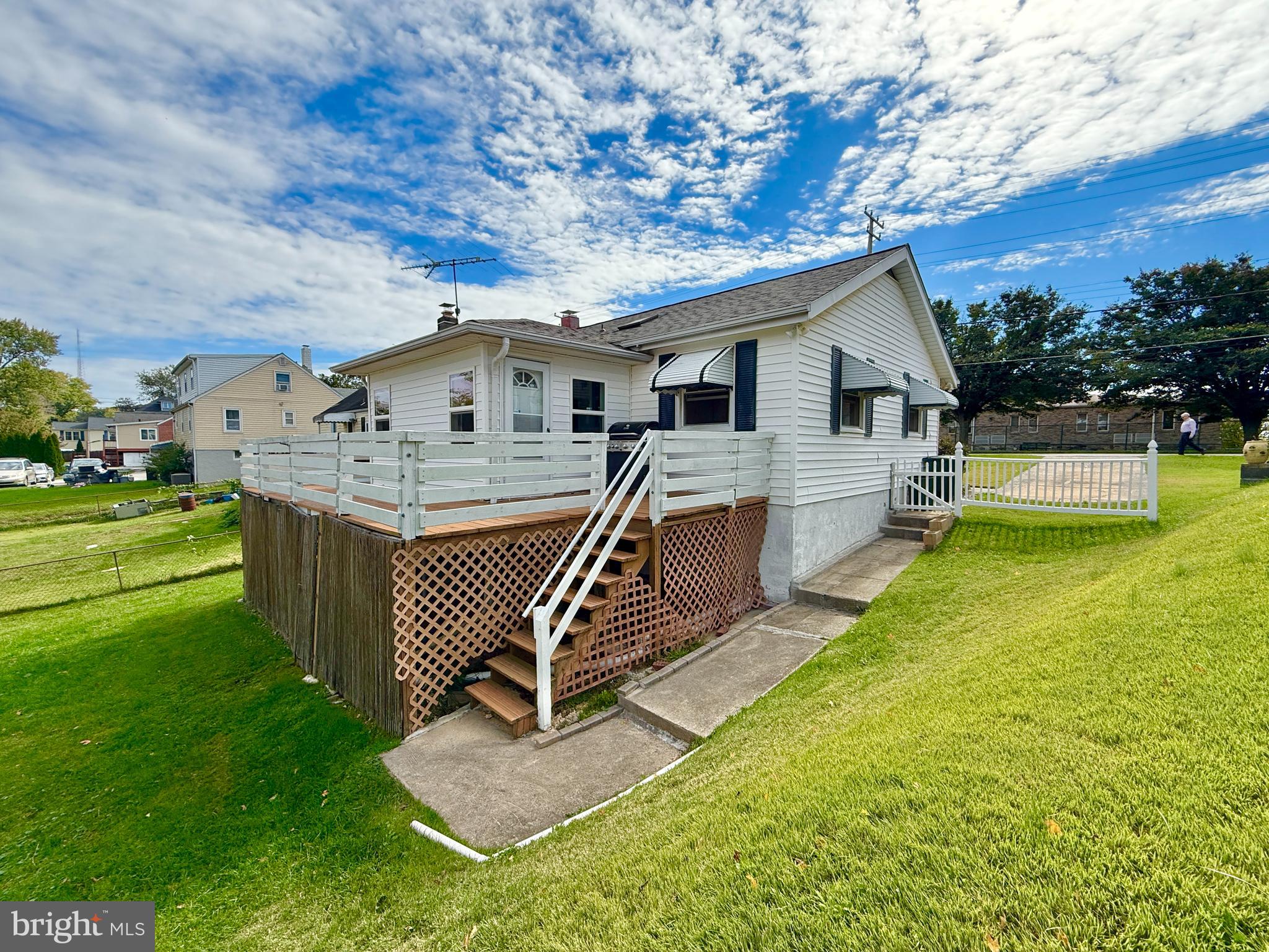 2002 Old Frederick Road Baltimore, MD 21228 - Photo 20 of 36 a front view of a house with garden and deck