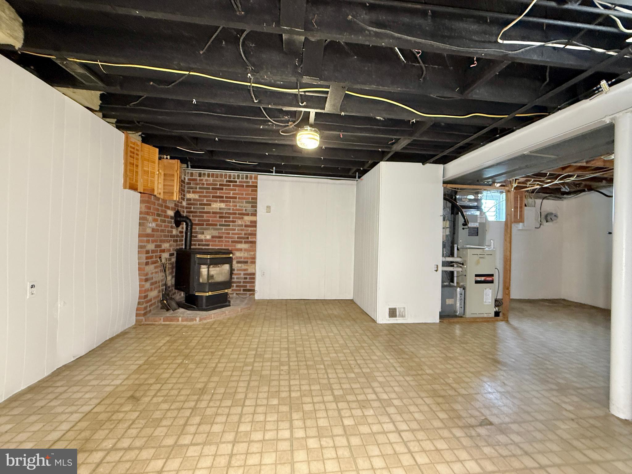 2002 Old Frederick Road Baltimore, MD 21228 - Photo 23 of 36 a view of empty room with wooden ceiling