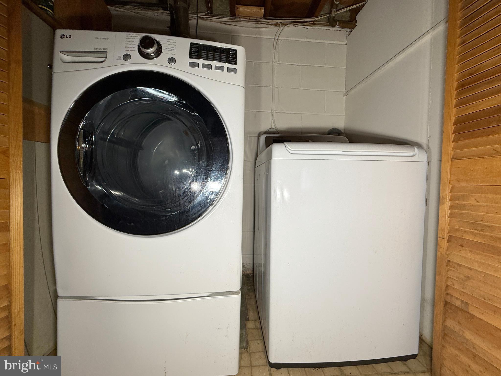 2002 Old Frederick Road Baltimore, MD 21228 - Photo 24 of 36 a utility room with dryer and washer