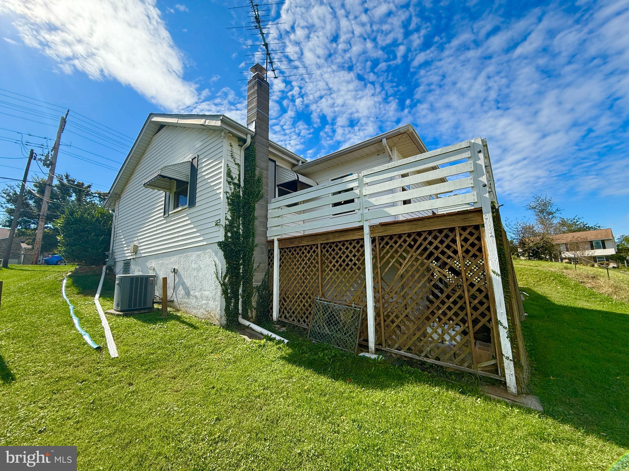 2002 Old Frederick Road Baltimore, MD 21228 - Photo 34 of 36 a view of a house with a yard