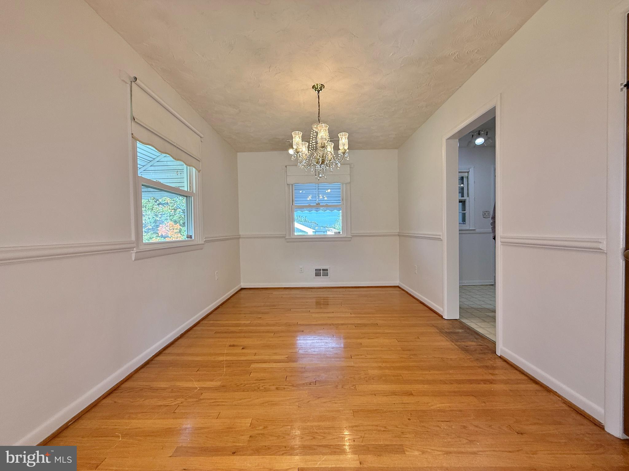 2002 Old Frederick Road Baltimore, MD 21228 - Photo 6 of 36 a view of an empty room and window