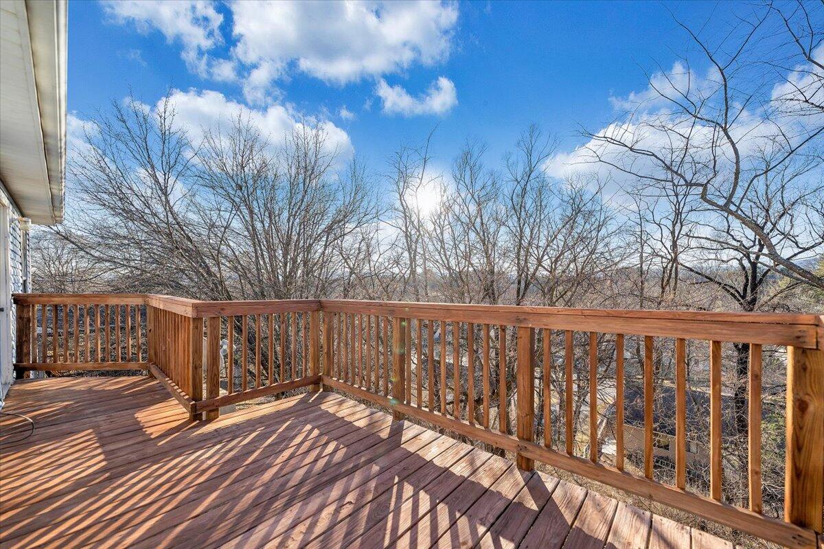 4902 Old Mountain Road Northeast Roanoke, VA 24019 - Photo 20 of 42 a view of deck with wooden floor and fence