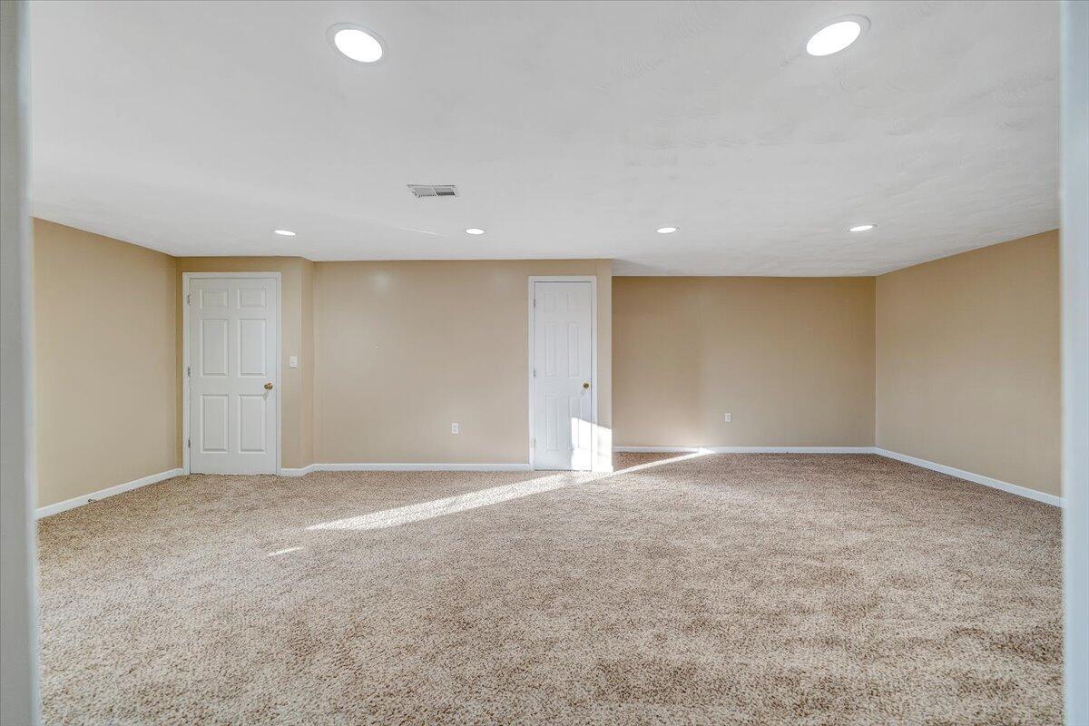 4902 Old Mountain Road Northeast Roanoke, VA 24019 - Photo 24 of 42 a view of an empty room with a window