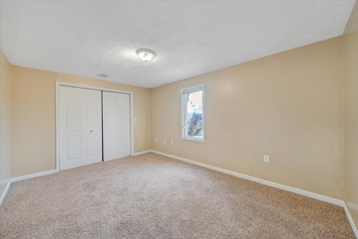 4902 Old Mountain Road Northeast Roanoke, VA 24019 - Photo 27 of 42 a view of an empty room with a window