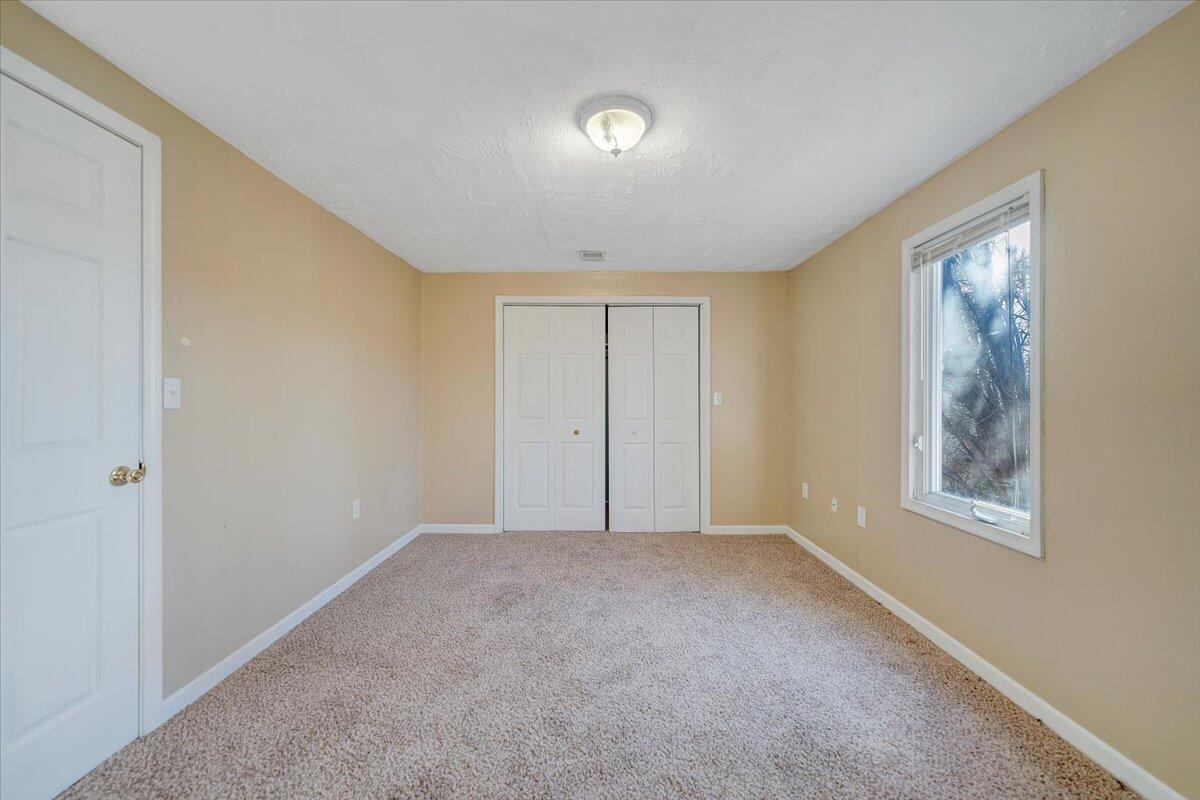 4902 Old Mountain Road Northeast Roanoke, VA 24019 - Photo 28 of 42 a view of an empty room with a window