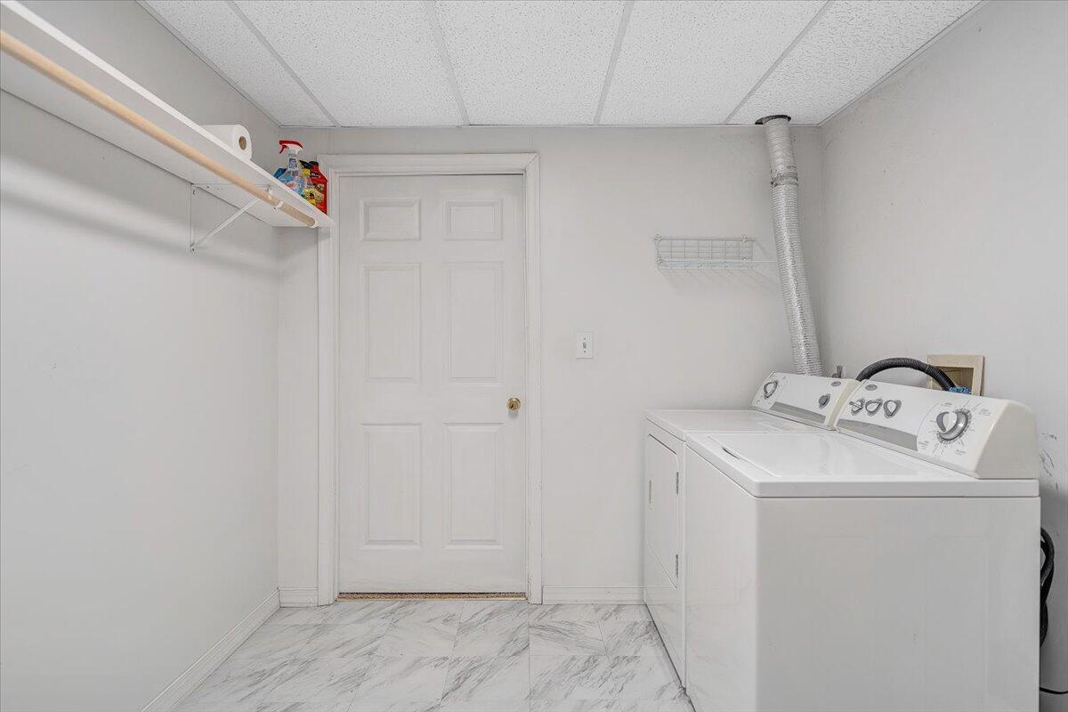 4902 Old Mountain Road Northeast Roanoke, VA 24019 - Photo 31 of 42 a utility room with dryer and washer