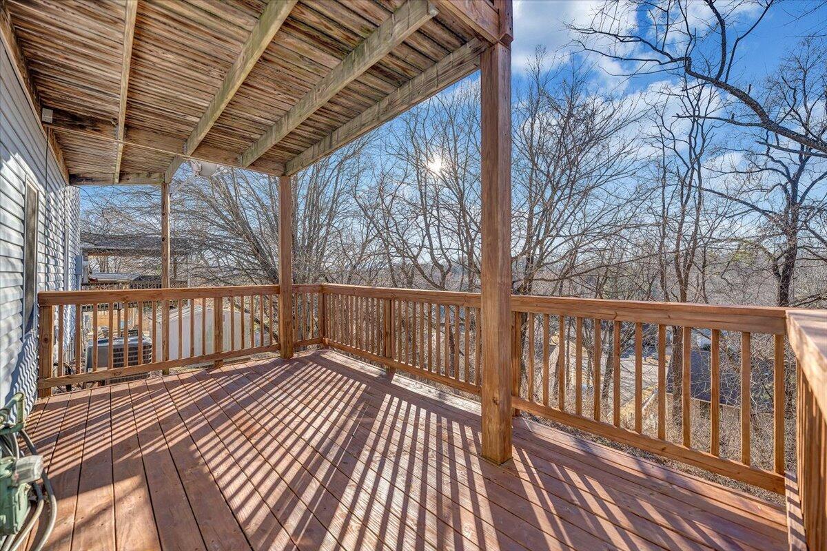 4902 Old Mountain Road Northeast Roanoke, VA 24019 - Photo 33 of 42 a view of wooden balcony with wooden floor
