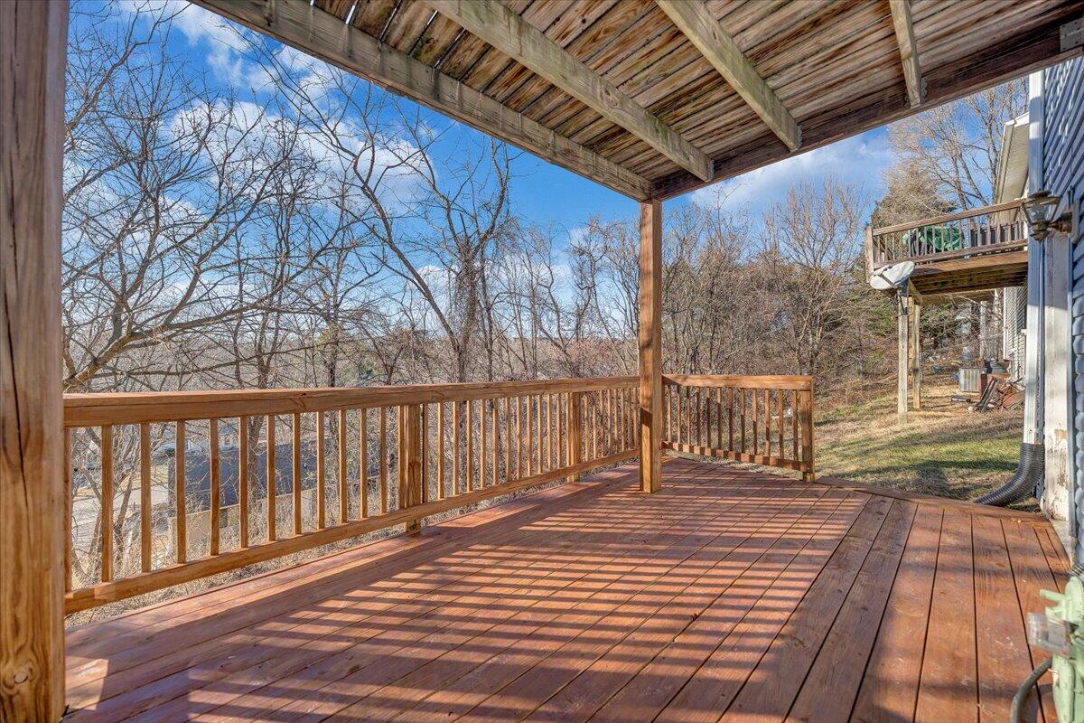 4902 Old Mountain Road Northeast Roanoke, VA 24019 - Photo 34 of 42 a balcony with wooden floor