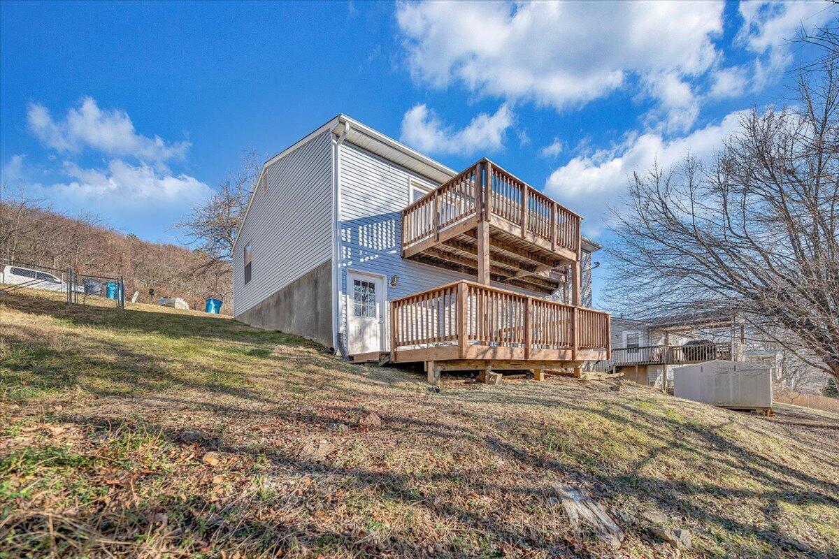 4902 Old Mountain Road Northeast Roanoke, VA 24019 - Photo 37 of 42 a view of a house with a yard