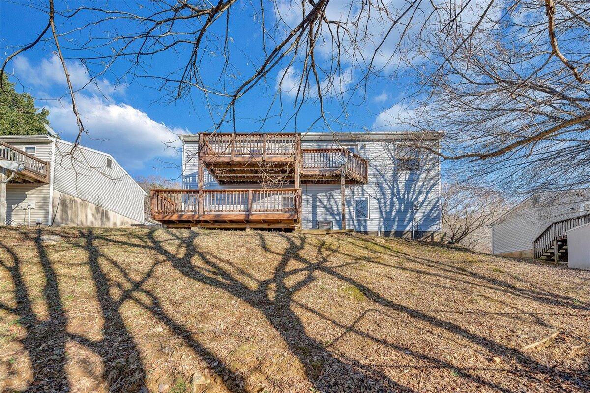 4902 Old Mountain Road Northeast Roanoke, VA 24019 - Photo 39 of 42 a view of a backyard with wooden fence