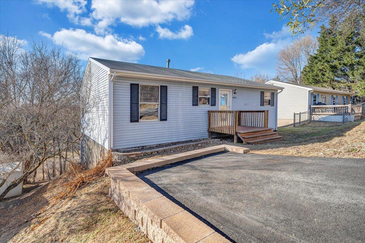 4902 Old Mountain Road Northeast Roanoke, VA 24019 - Photo 41 of 42 a view of a house with a yard