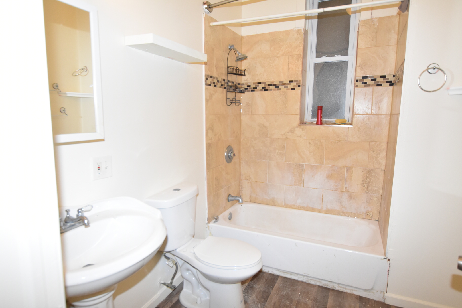4056 West Jackson Boulevard, Unit 2 Chicago, IL 60624 - Photo 11 of 14 a bath room with a toilet and a bath tub