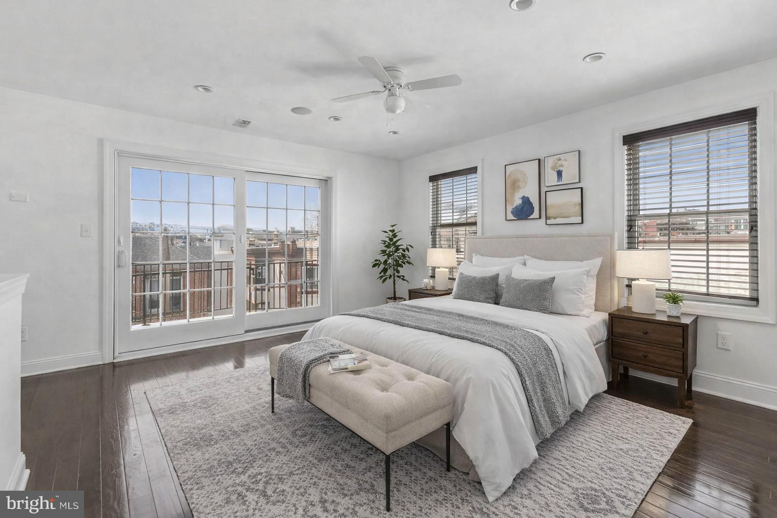 1015 North 3rd Street, Unit H Philadelphia, PA 19123 - Photo 10 of 27 a spacious bedroom with a large bed and a couch