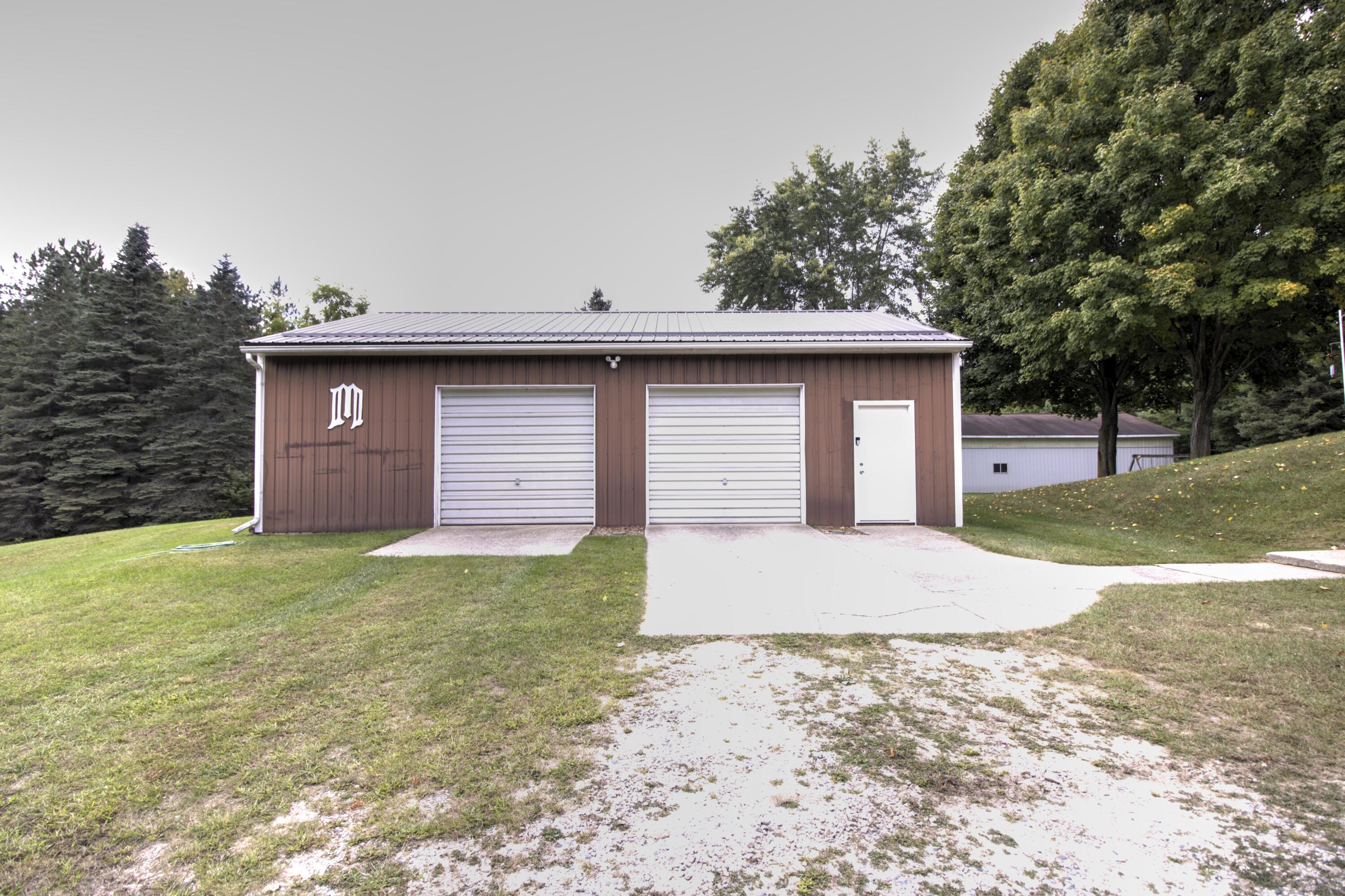 318 Mt Hope Road South Crystal, MI 48818 - Photo 10 of 38 2 car garage