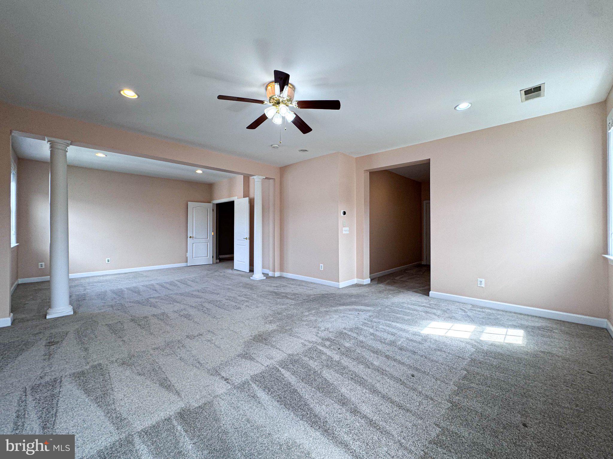 22827 Oakgrove Road Sterling, VA 20166 - Photo 30 of 56 Spacious, light-filled living area.