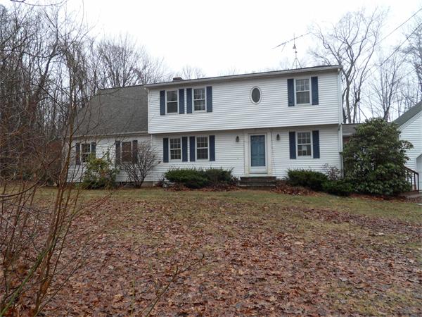 63 Purgatory Road Sutton, MA 01590 - Photo 1 of 22 a front view of a house with a yard