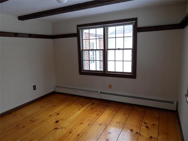 63 Purgatory Road Sutton, MA 01590 - Photo 11 of 22 a view of an empty room with a window