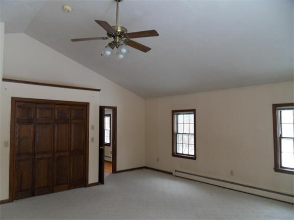 63 Purgatory Road Sutton, MA 01590 - Photo 13 of 22 a view of an empty room with a window
