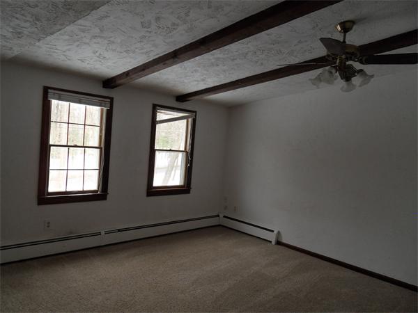 63 Purgatory Road Sutton, MA 01590 - Photo 15 of 22 an empty room with a window