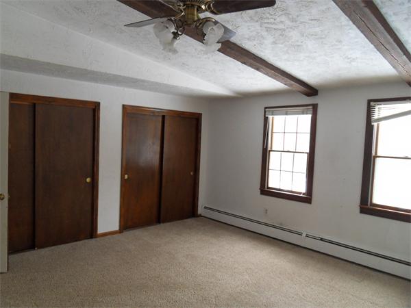 63 Purgatory Road Sutton, MA 01590 - Photo 16 of 22 an empty room with windows and closet