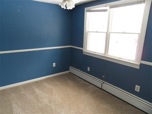 63 Purgatory Road Sutton, MA 01590 - Photo 18 of 22 an empty room with a window