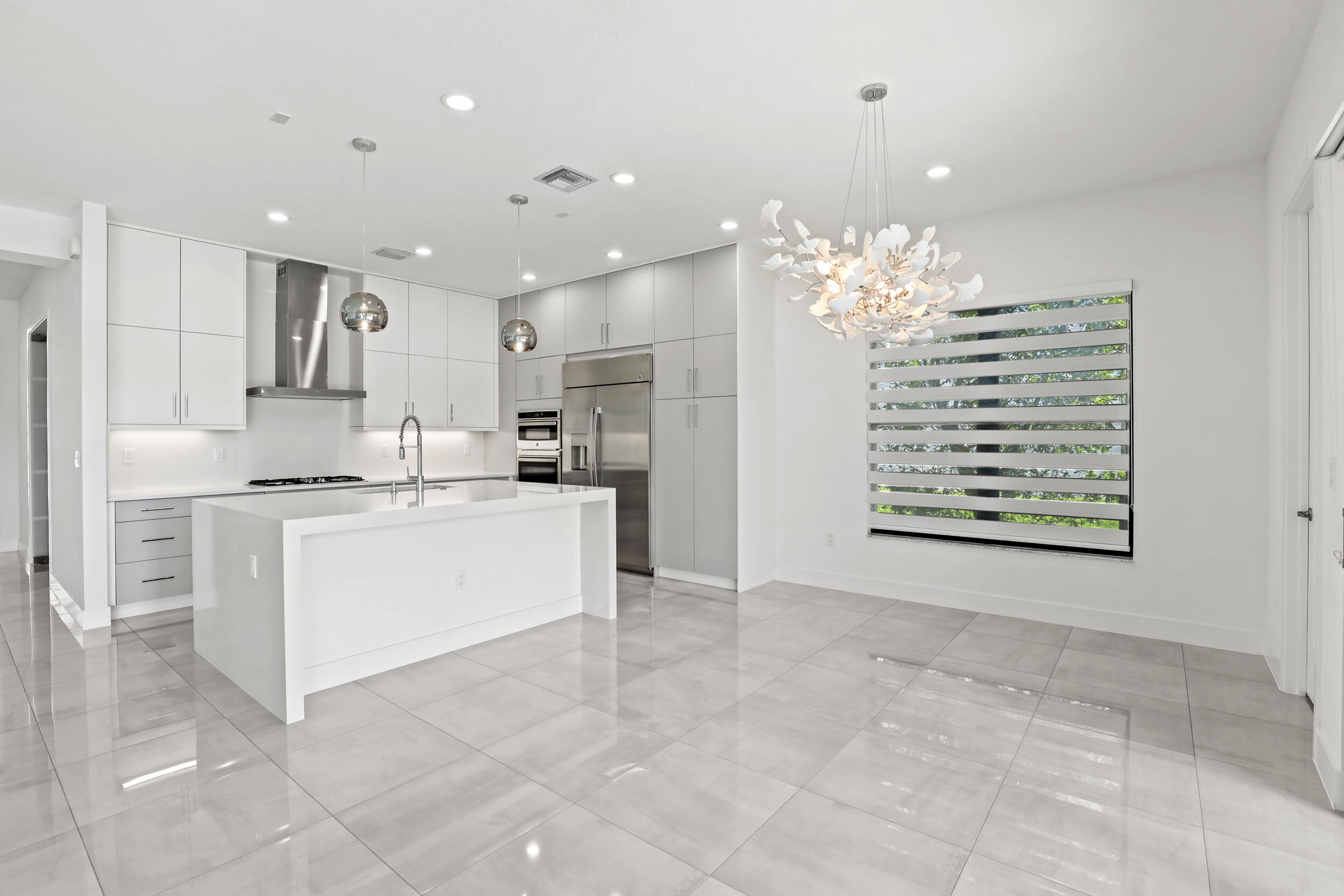 17094 Rainbow Fls Trail Boca Raton, FL 33496 - Photo 8 of 38 Dining and Kitchen Area
