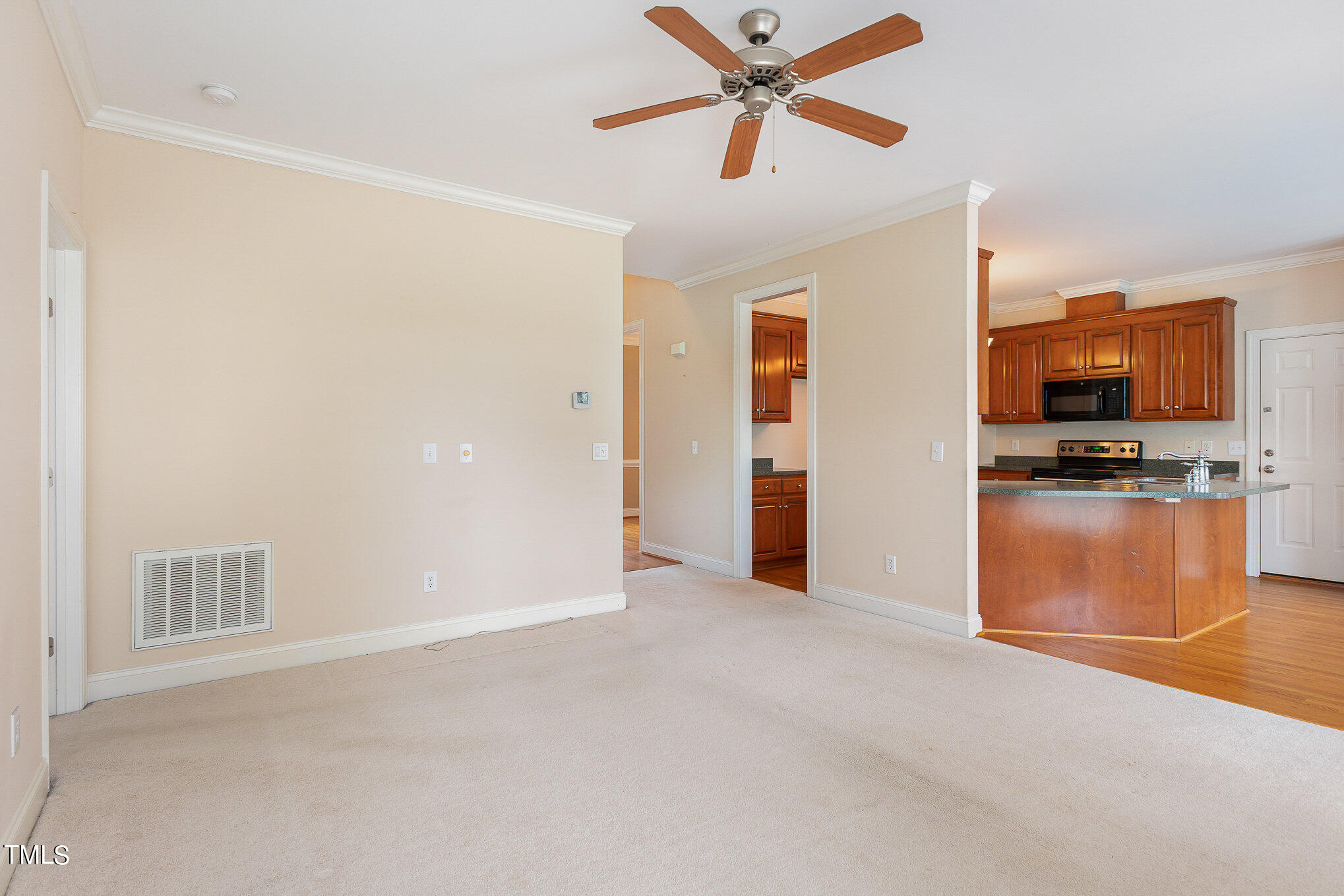 2809 Oak Bridge Drive Raleigh, NC 27610 - Photo 11 of 37 a view of a livingroom with a flat screen tv