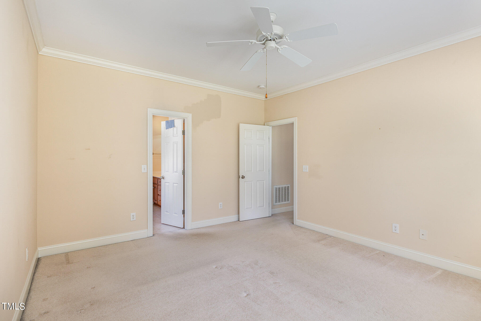2809 Oak Bridge Drive Raleigh, NC 27610 - Photo 16 of 37 an empty room with a empty space and a ceiling fan