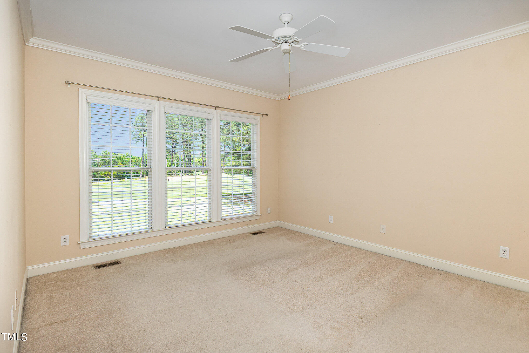 2809 Oak Bridge Drive Raleigh, NC 27610 - Photo 17 of 37 a view of an empty room with a window