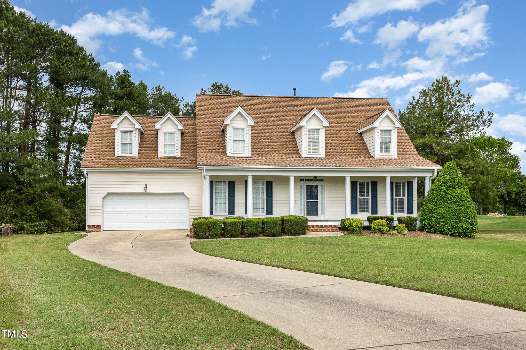2809 Oak Bridge Drive Raleigh, NC 27610 - Photo 2 of 37 a front view of a house with a yard