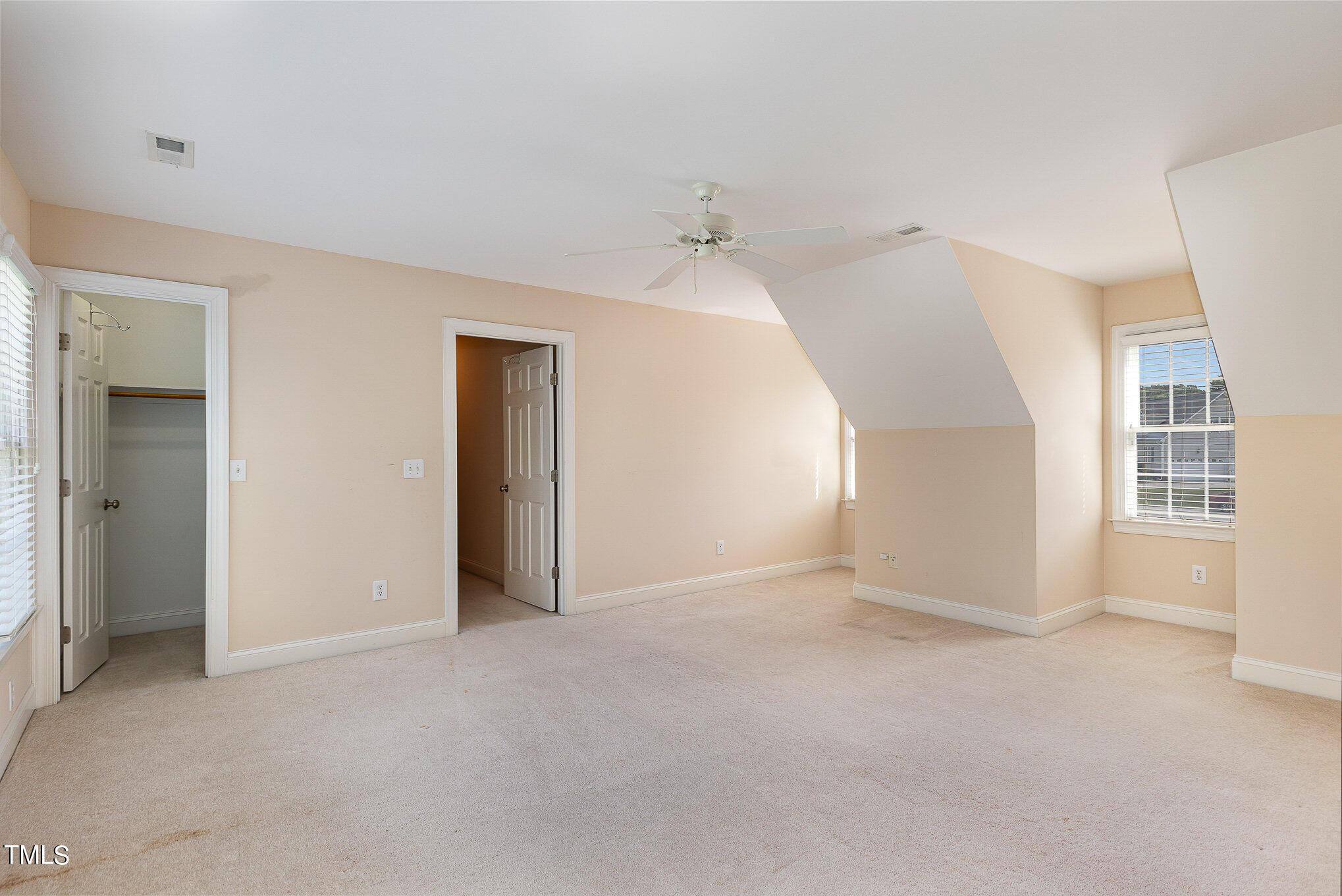 2809 Oak Bridge Drive Raleigh, NC 27610 - Photo 23 of 37 a view of an empty room with a window