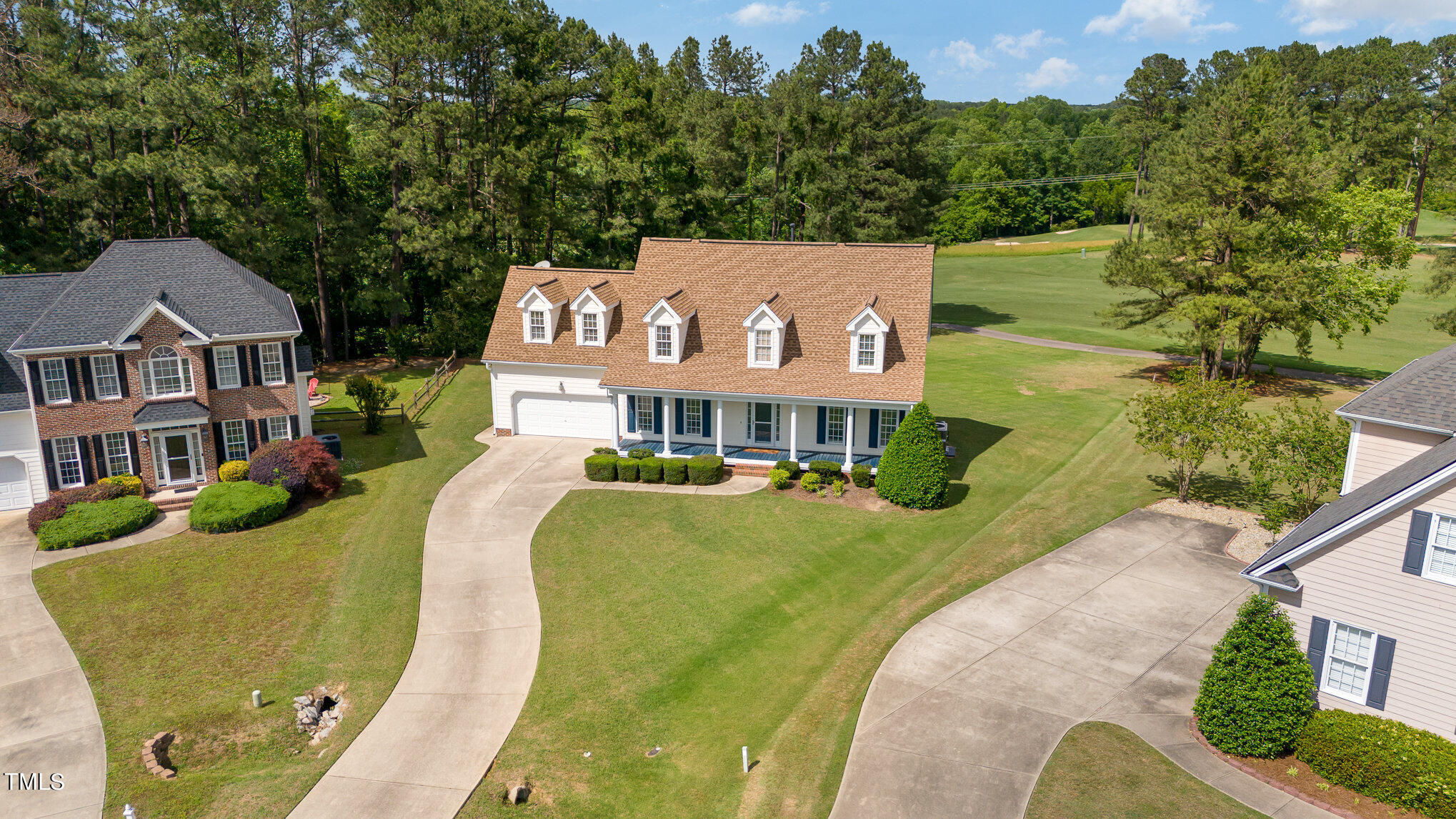 2809 Oak Bridge Drive Raleigh, NC 27610 - Photo 4 of 37 an aerial view of a house with a swimming pool