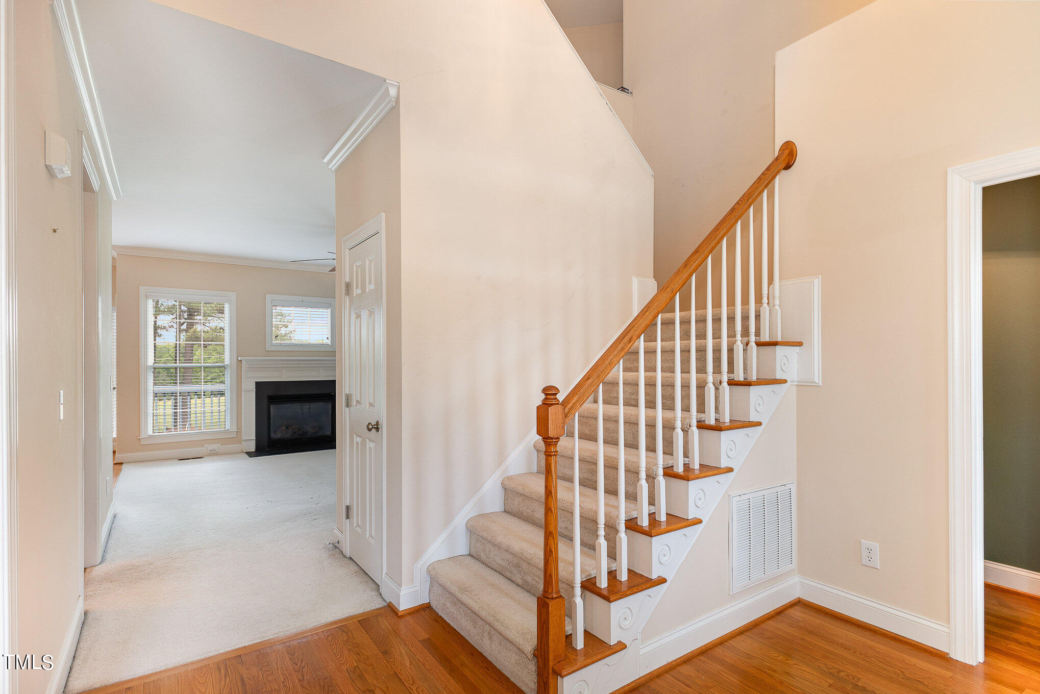 2809 Oak Bridge Drive Raleigh, NC 27610 - Photo 6 of 37 a view of entryway and hall with wooden floor