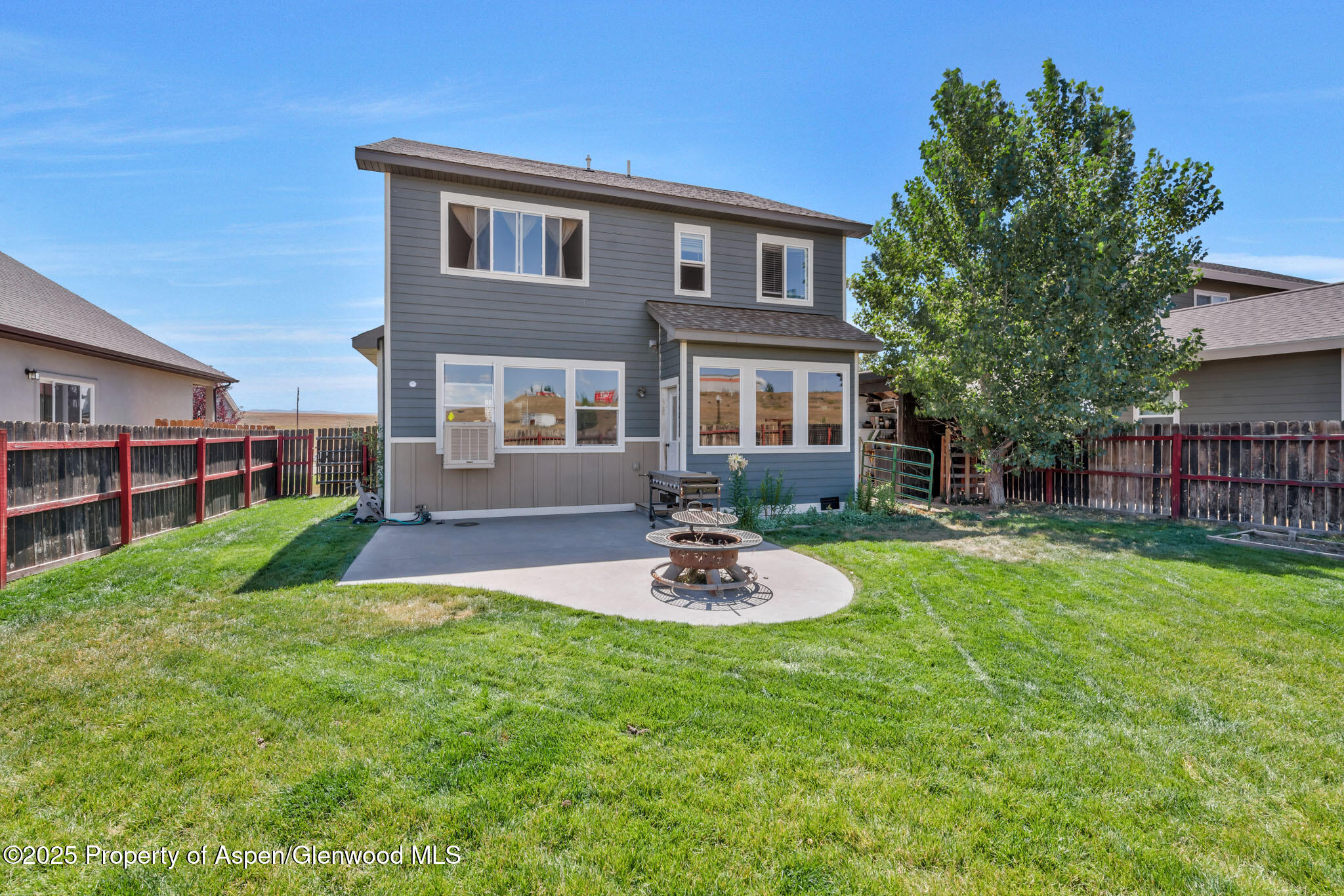 875 Dry Creek Road Hayden, CO 81639 - Photo 33 of 40 a front view of house with yard and outdoor seating