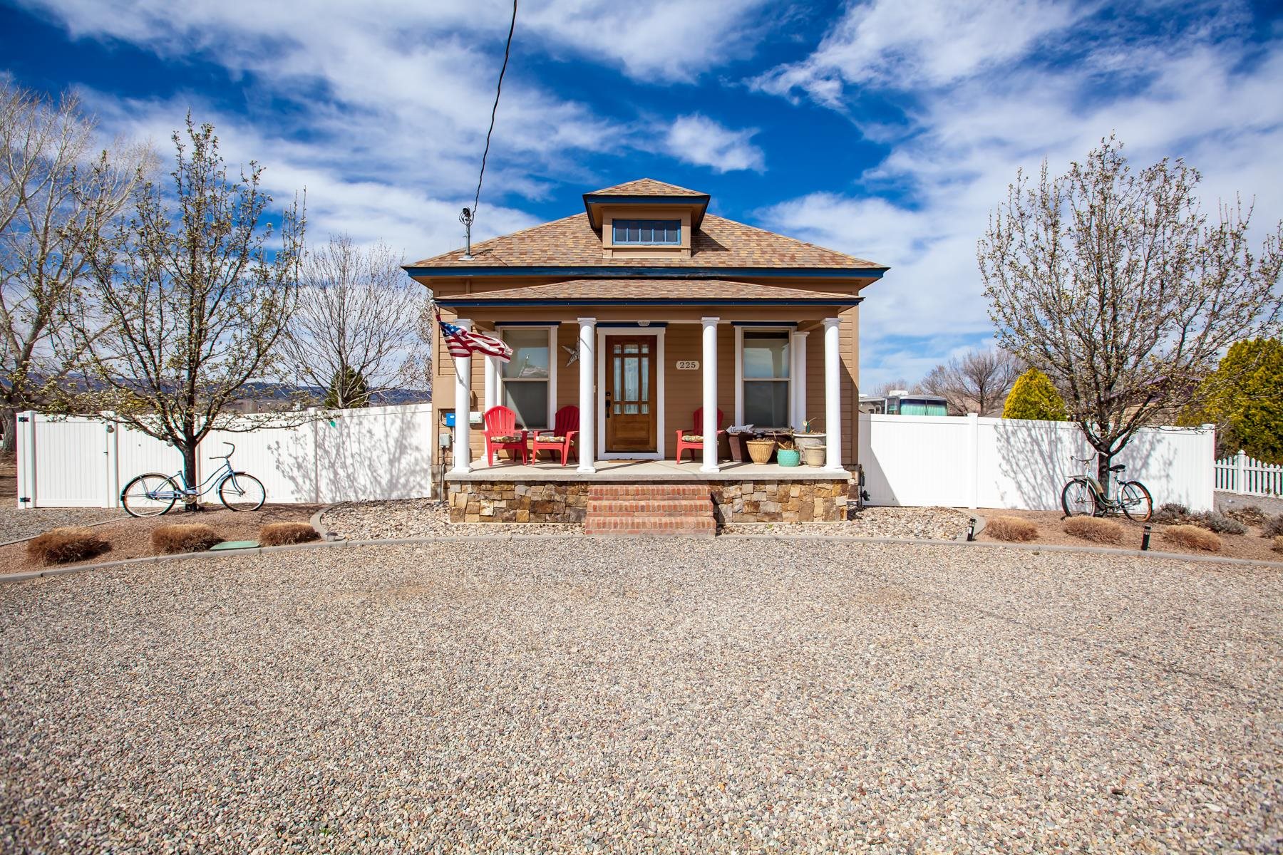 225 29 Road Grand Junction, CO 81503 - Photo 1 of 41 a view of a house with large space and a car parked