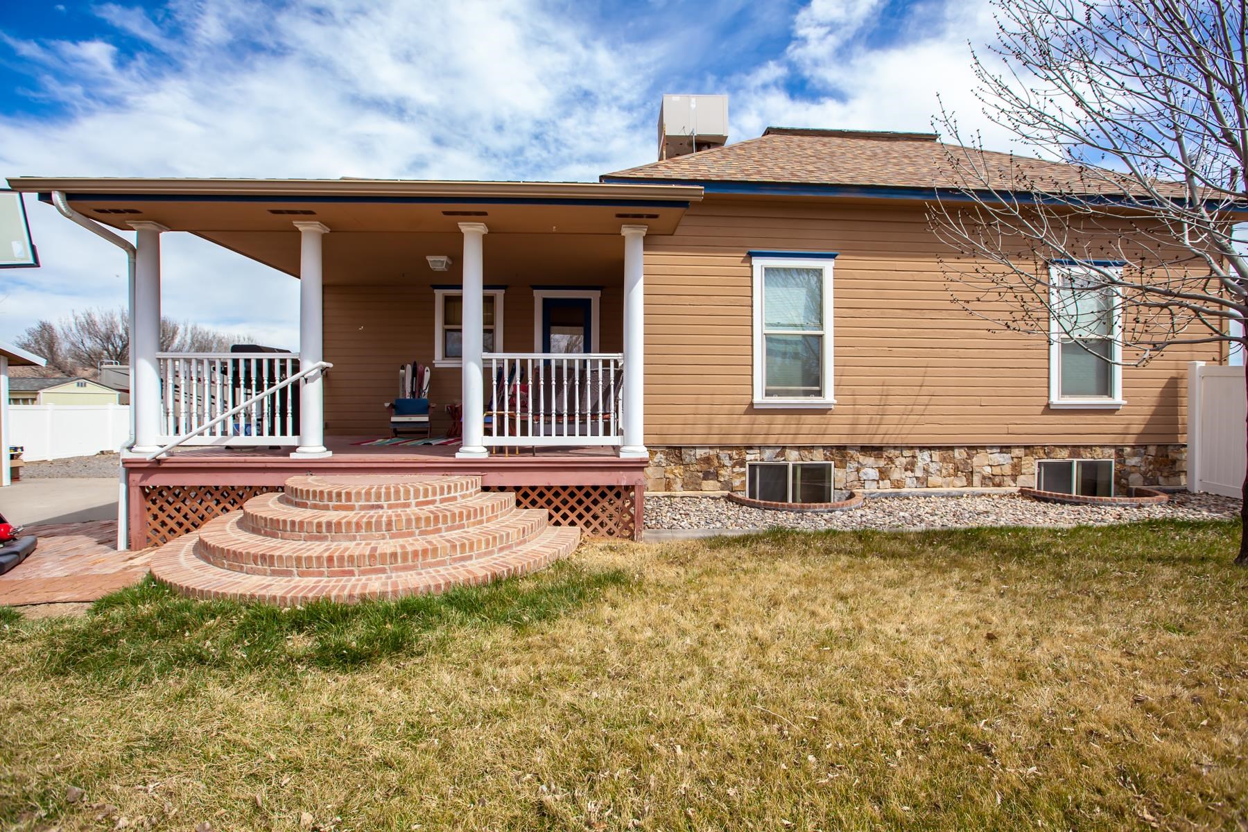 225 29 Road Grand Junction, CO 81503 - Photo 11 of 41 a front view of a house with a yard