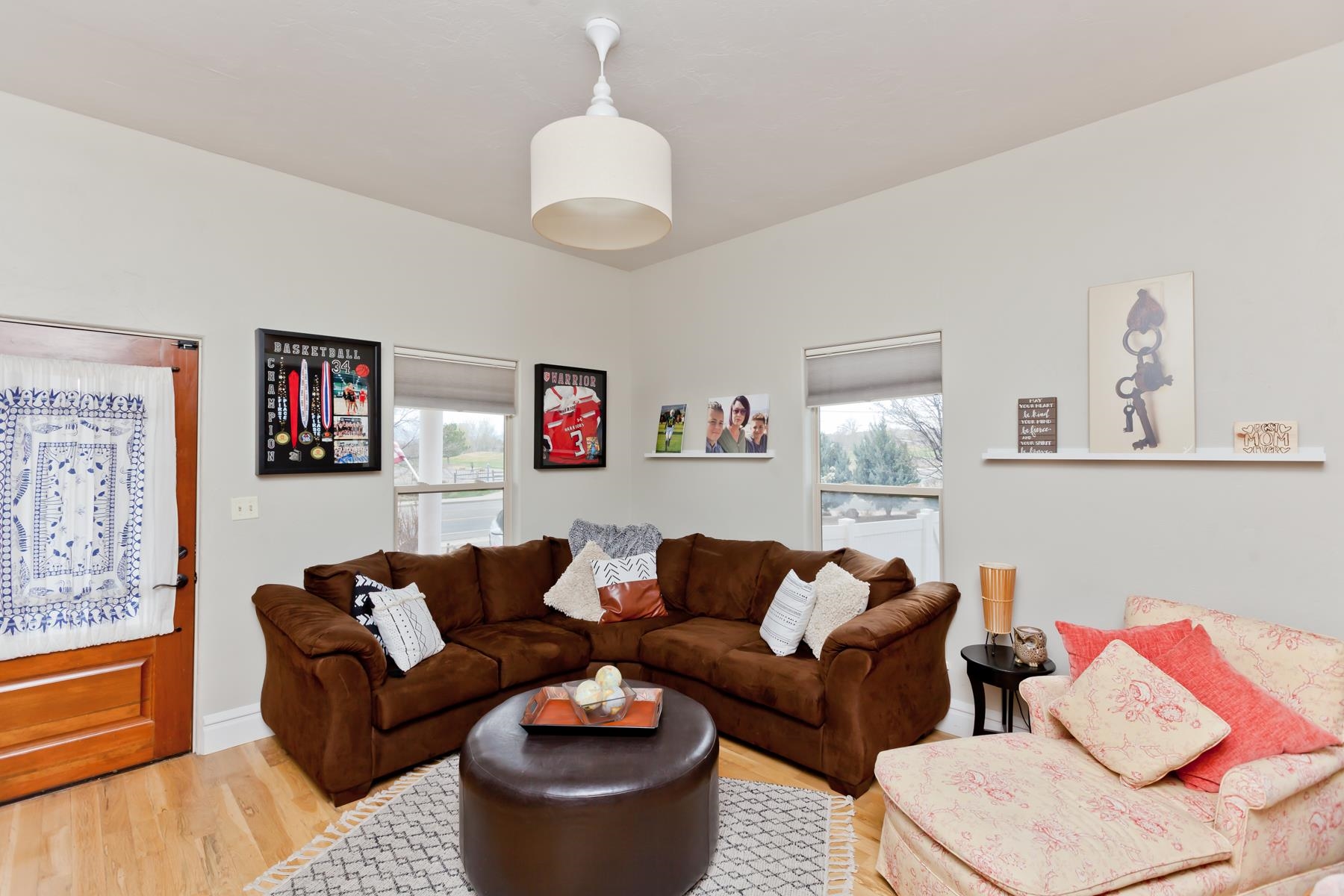 225 29 Road Grand Junction, CO 81503 - Photo 14 of 41 a living room with furniture a couch and a chandelier