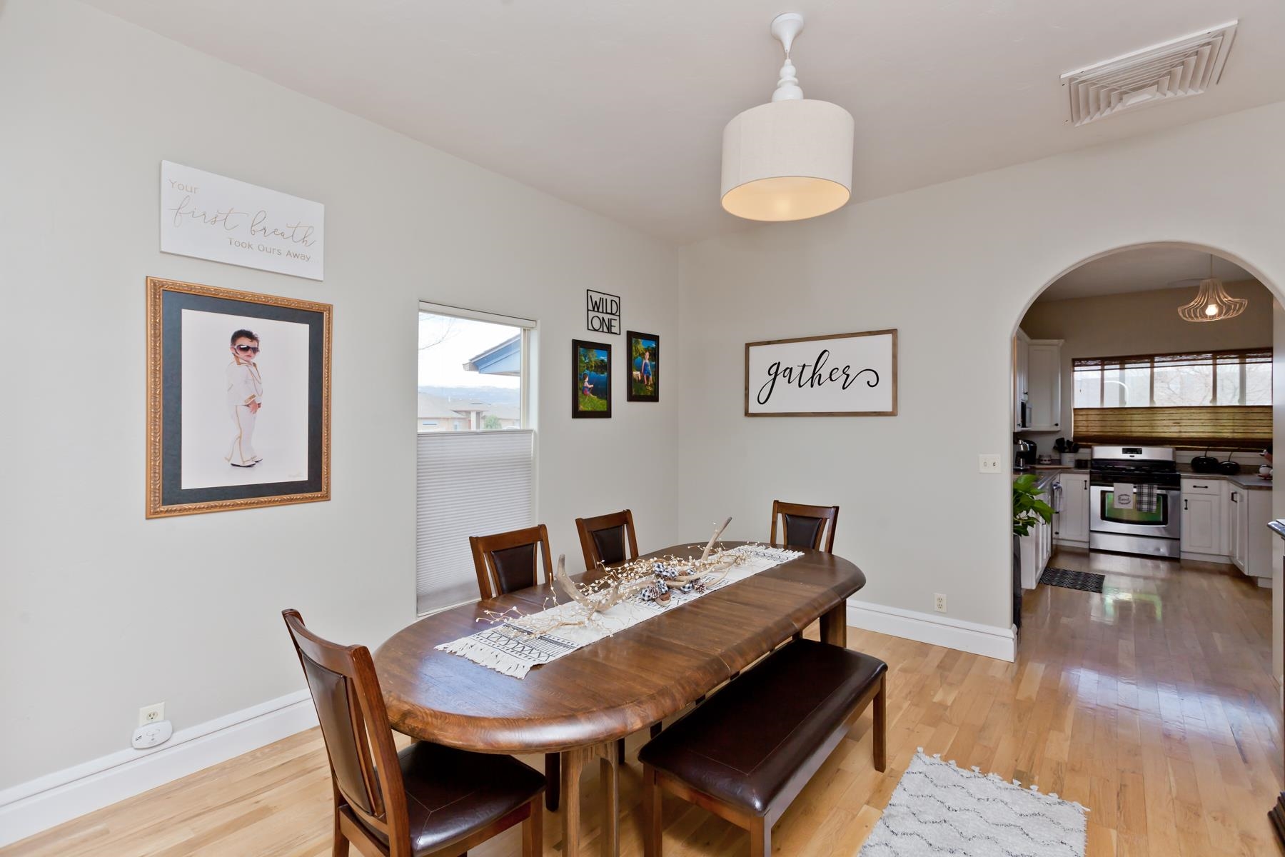 225 29 Road Grand Junction, CO 81503 - Photo 17 of 41 a view of a dining room with furniture and wooden floor