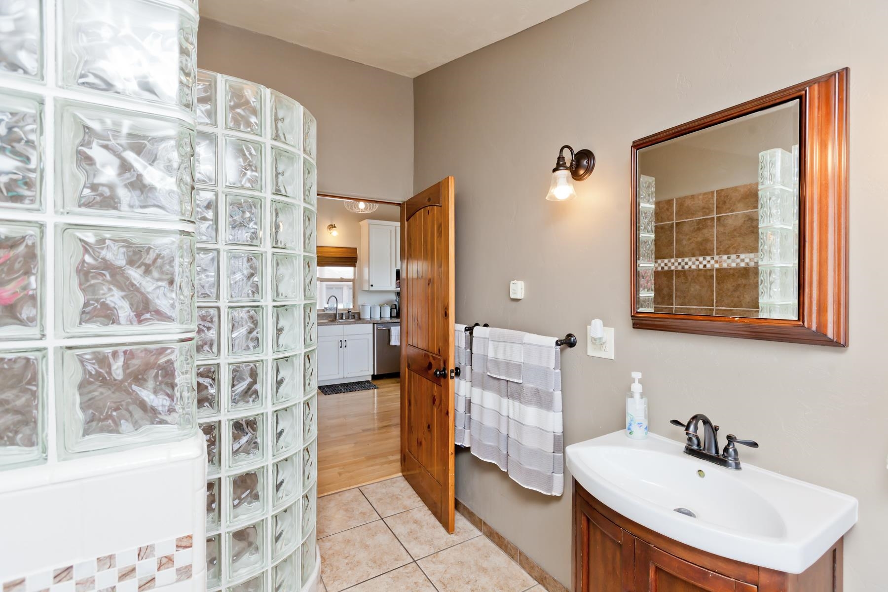 225 29 Road Grand Junction, CO 81503 - Photo 27 of 41 a bathroom with a sink and a mirror
