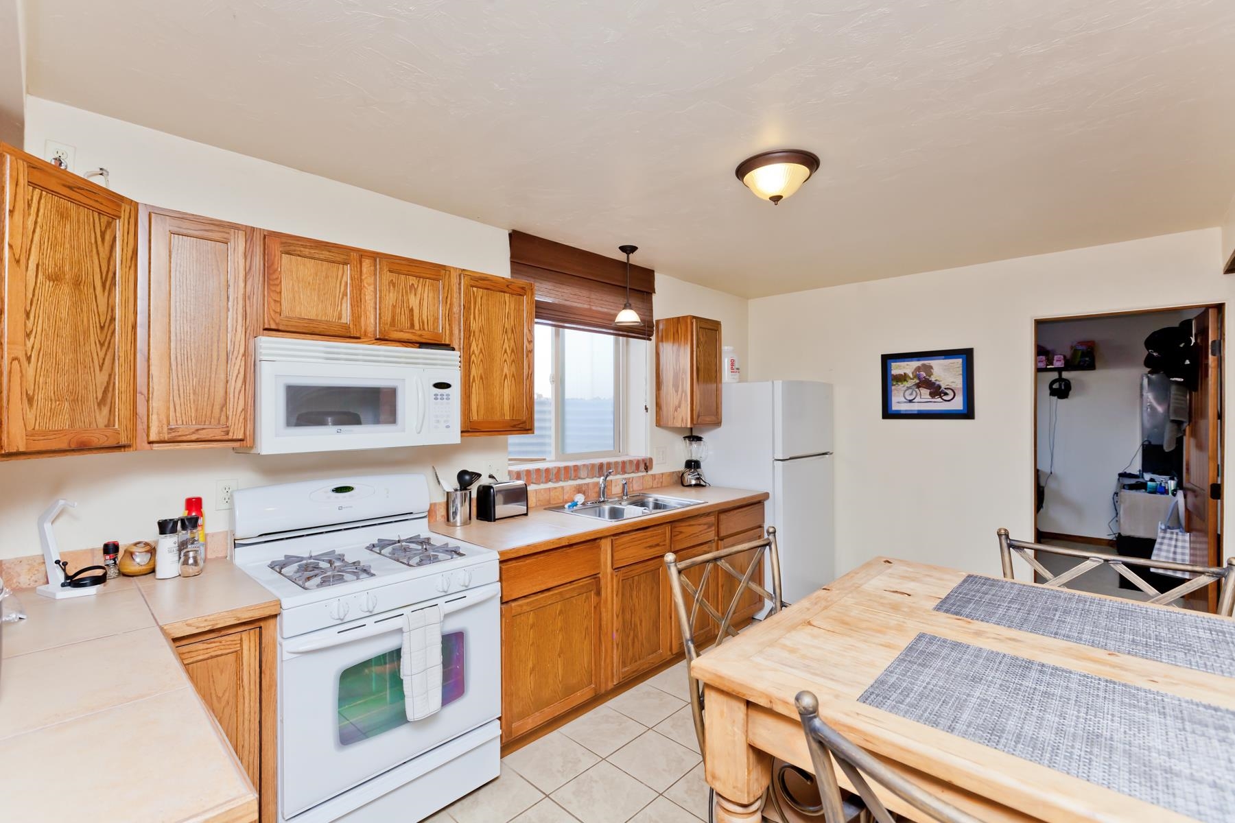 225 29 Road Grand Junction, CO 81503 - Photo 37 of 41 a kitchen that has a sink and a stove in it