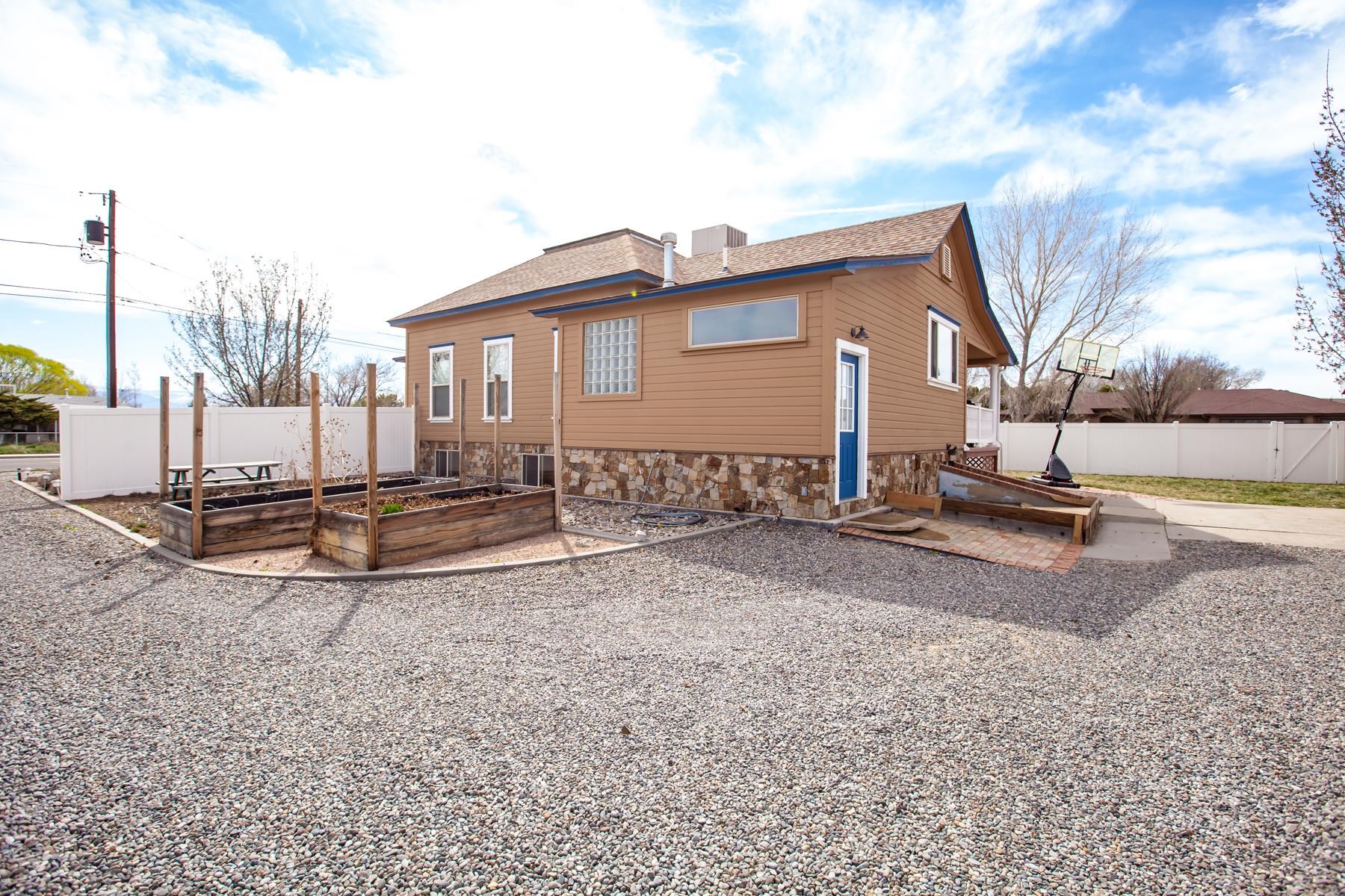225 29 Road Grand Junction, CO 81503 - Photo 5 of 41 a view of a house with backyard and a tree