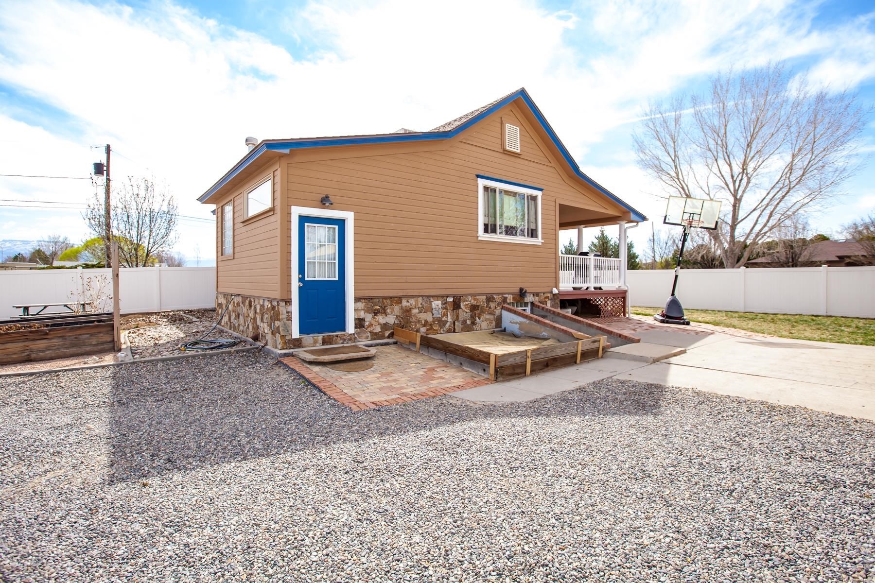 225 29 Road Grand Junction, CO 81503 - Photo 6 of 41 a view of a house with swimming pool and sitting area